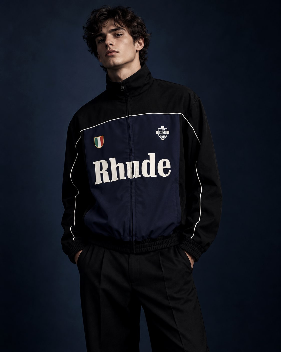 Navy track jacket in the lead editorial setting